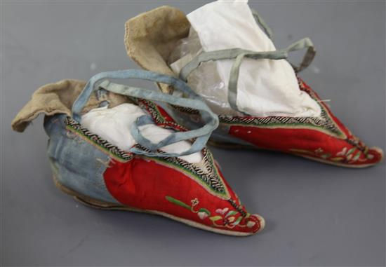 Four pairs of Chinese embroidered silk ladys shoes, late Qing dynasty
